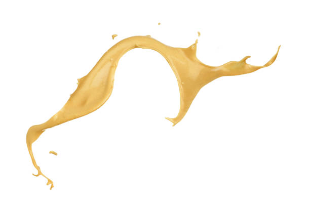 mustard splash on white background stock photo