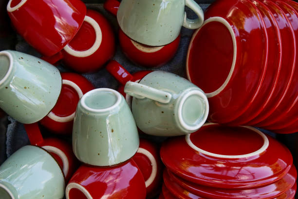 istock Many green and red ceramic coffee cups 1152377930