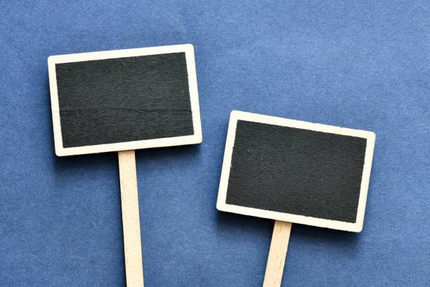 istock close up view of empty chalkboard on wooden backdrop 1152379040