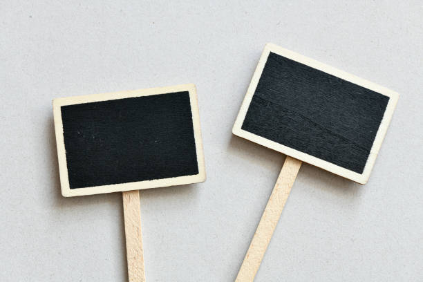 istock close up view of empty chalkboard on wooden backdrop 1152379107