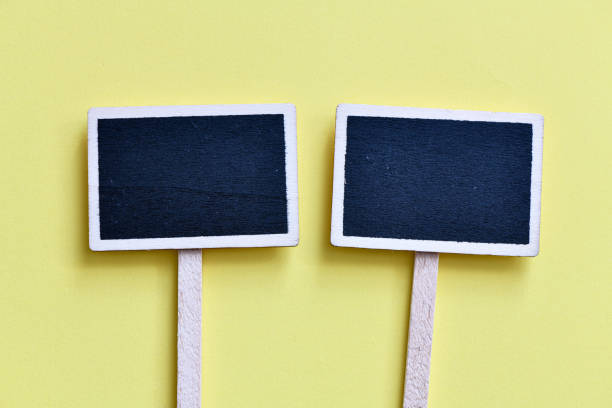istock close up view of empty chalkboard on wooden backdrop 1152379164