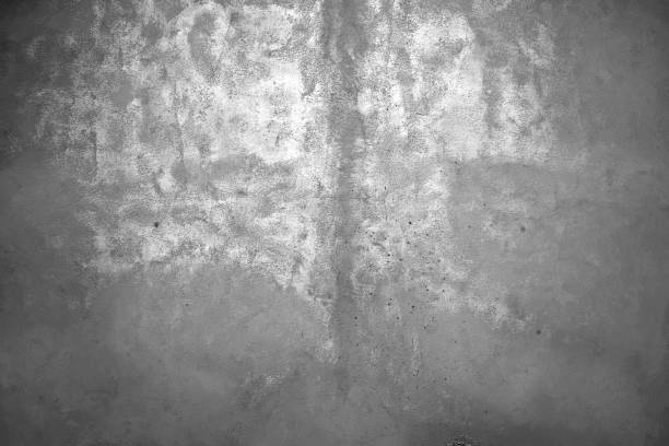 istock Monochrome Wall on street with grunge effect , cement texture, plaster background 1152380497