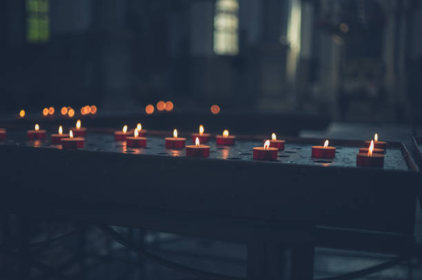 istock Votive candles in a church 1152384108