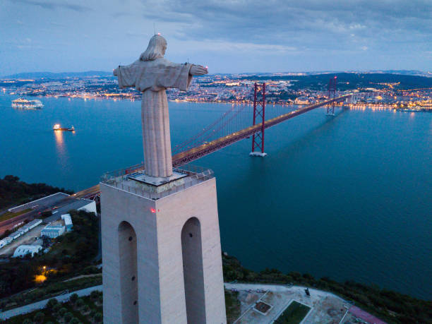 istock Illuminated Lisbon and 25th April Bridge 1152386513