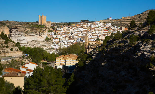 istock Panoramic view of Alcala del Jucar with mountains, Spain 1152386571