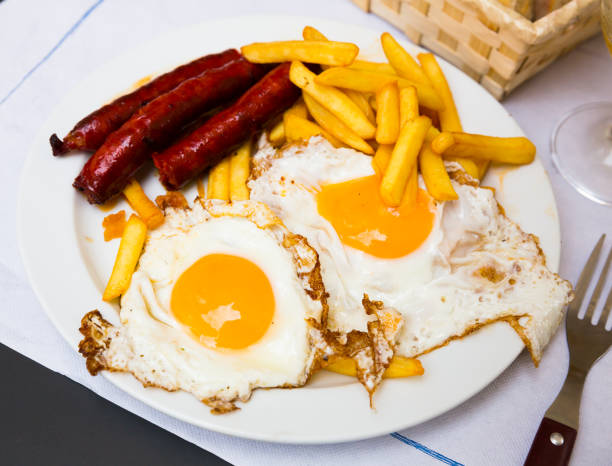 istock Huevos con chistorra. Scrambled eggs with sausage and potatoes. Spanish cuisine 1152386598