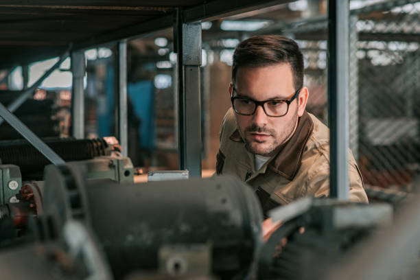 istock Mechanic working at train factory, close-up. 1152388162