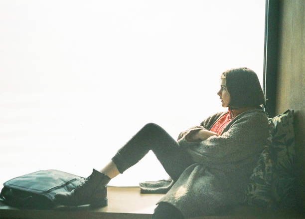 A lone teenager looks out at nothingness, 35mm film.