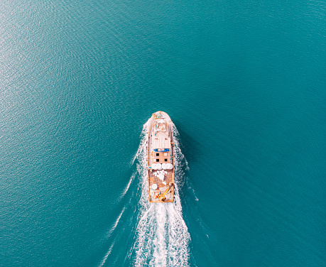 Aerial View Fast Moving Fishing Boat on Blue Sea