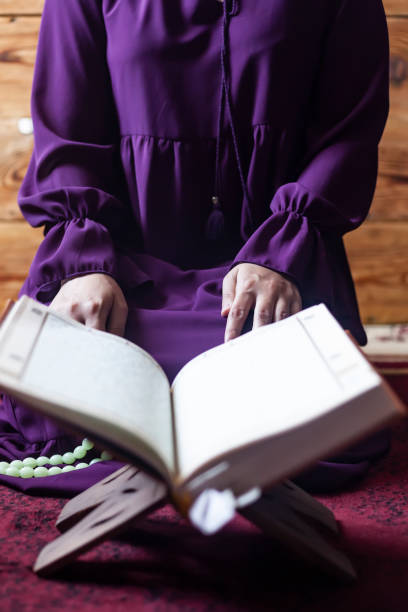 istock Praying young Muslim woman 1152399523