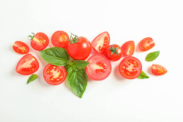 istock Flat lay composition with fresh cherry tomatoes and basil on white background, space for text. Ripe vegetables 1152399808
