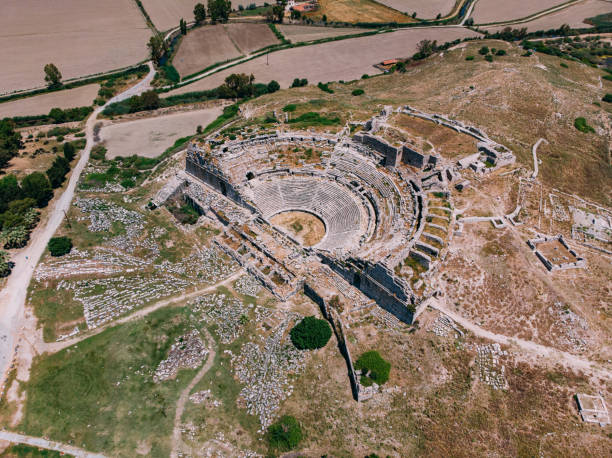 Big Amphitheater in Miletus Ancient City Aerial View 2200 Year Old Amphitheater in Miletus Ancient City. greek amphitheater stock pictures, royalty-free photos & images