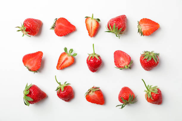 istock Flat lay composition with strawberries on white background, space for text. Summer sweet fruits and berries 1152401507