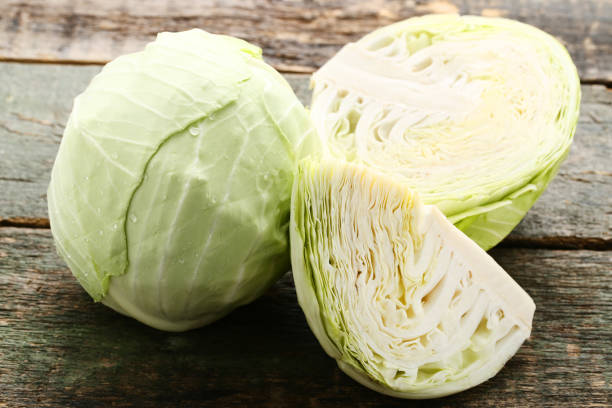 istock Ripe cabbage on gray wooden table 1152401556