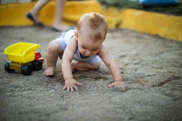 istock Playing time with sand and toy truck 1152408820