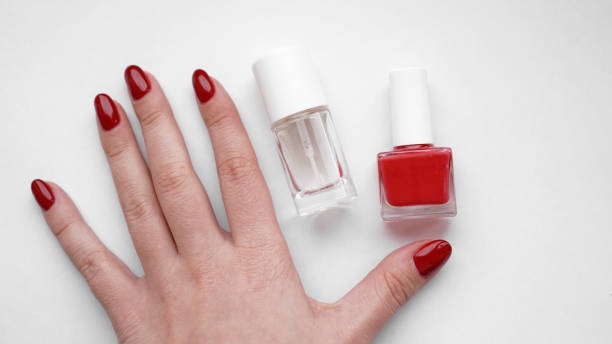 istock Beautiful Woman Hands With Red Manicure 1152411070