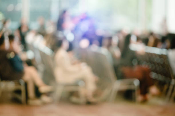 istock Blurry of auditorium for shareholders' meeting or seminar event 1152411194