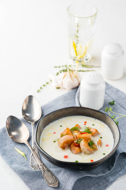 istock Creamy shrimp soup in a dark plate 1152412817