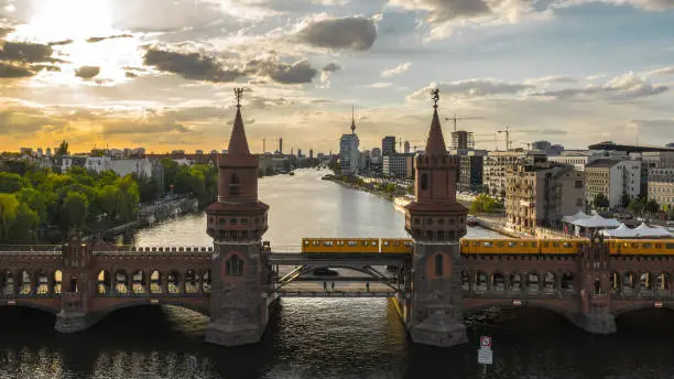 Oberbaum Bridge in Berlin before sunset. Aerial view