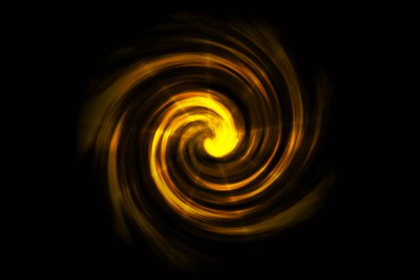 istock Glowing spiral tunnel with golden fog on black backdrop 1152417093