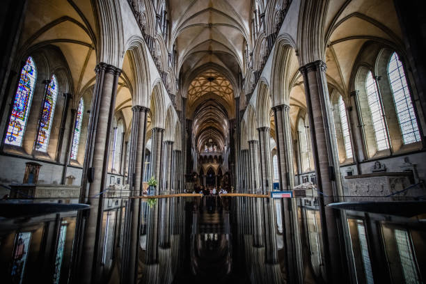 Salisbury, United Kingdom – August 26th 2017: reflection image of Salisbury Cathedral in the water