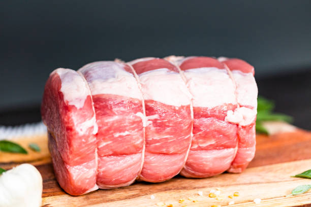 istock Uncooked boneless pork roast on the cutting board. 1152418833