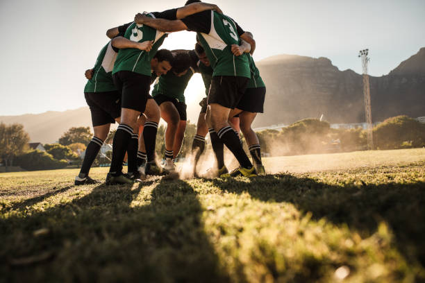istock Rugby team showing aggression after the win 1152420013