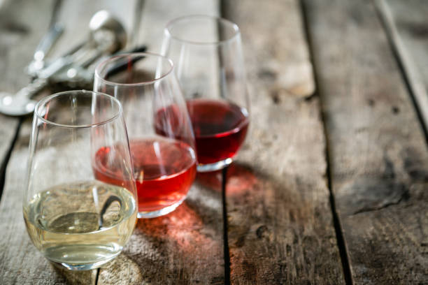 istock WIne tasting concept - red, rose and white wine in glasses 1152420488