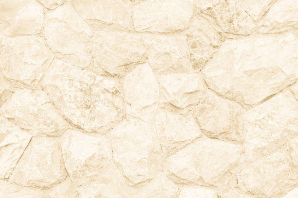 abstract texture of a wall from a natural stone of monochrome tone sepia