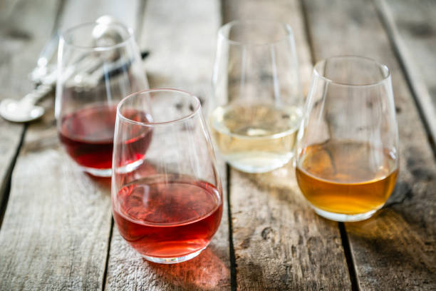 istock WIne tasting concept - red, rose and white wine in glasses 1152422076