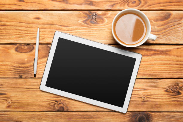 istock digital tablet and coffee cup on wooden table 1152422232
