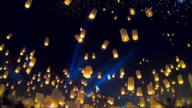 Floating lanterns and fireworks Yee Peng Festival, Loi Krathong Festival in Chiang mai, Thailand