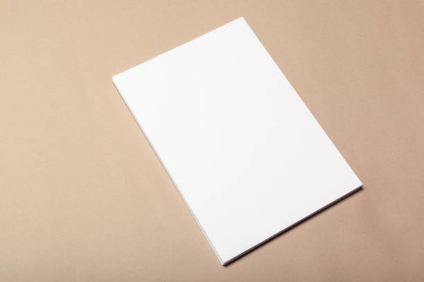 istock Blank paper pieces for mock up on a beige background 1152424952