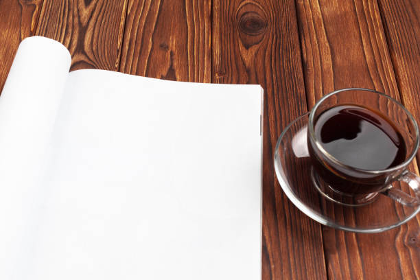 istock Open blank journal pages for your design copy space on wooden background 1152425458