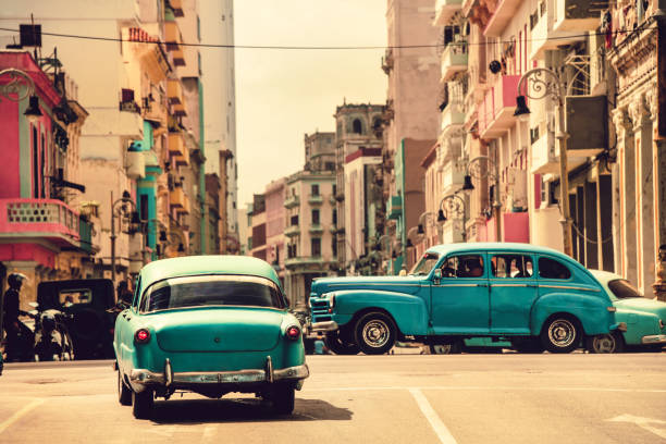 Vintage Cars Rolling On Hot Cuban Streets