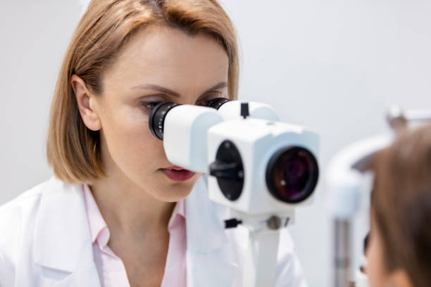 istock Mature optometrist examining patient at hospital 1152425500