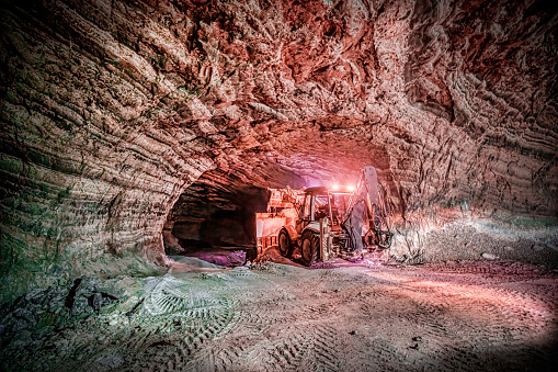 Salt cave and a loader vehicle working