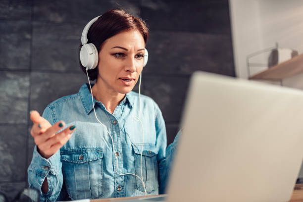 istock Business woman doing video call at office 1152426064
