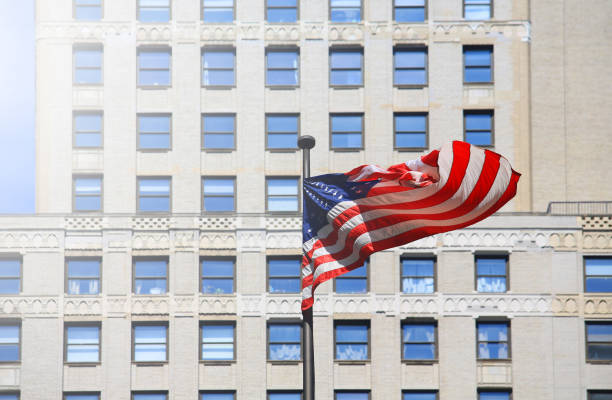 istock american flag wave in the city 1152426792