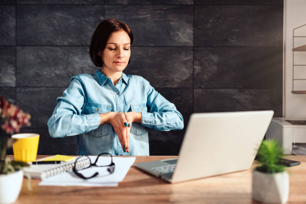 istock Business woman stretching hands in the office 1152427021