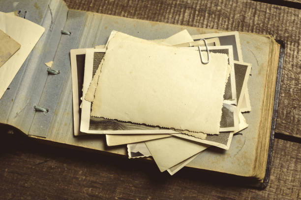 istock old photos on the wooden table 1152429720