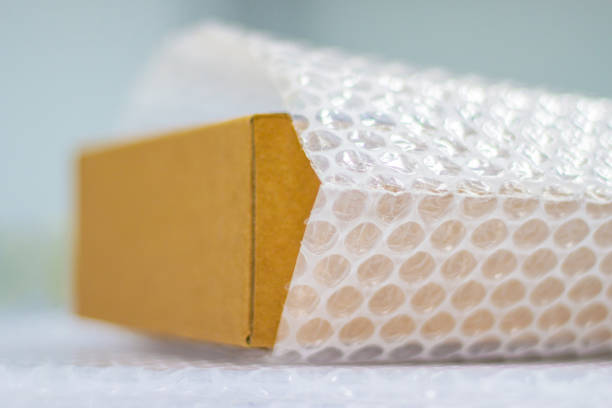 Bubbles covering the box by bubble wrap for protection product stock photo