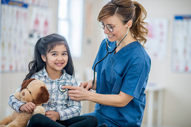istock Child at medical appointment. 1152430380