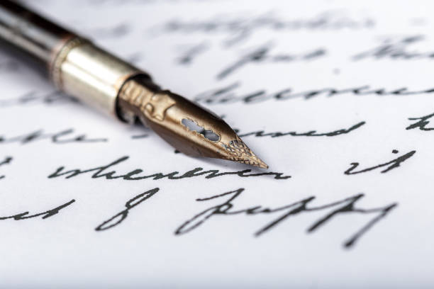 istock Fountain pen on an antique handwritten letter 1152430471