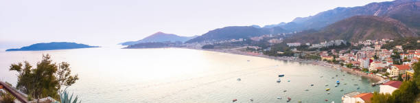 istock Montenegro, Rafailovici. Sunset view on sea beach. 1152430835