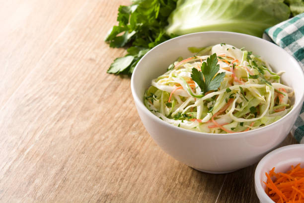 istock Coleslaw salad in white bowl 1152431344