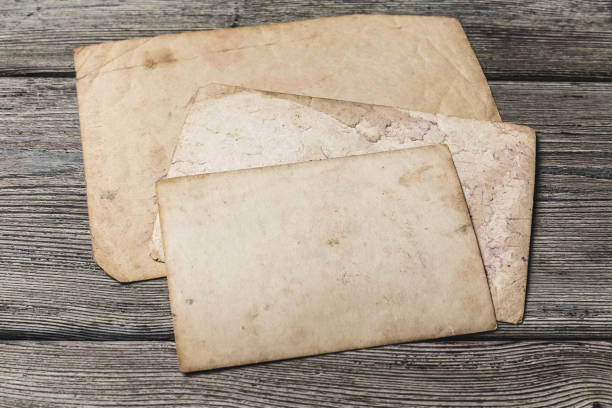 istock retro some old photos on wooden table 1152431496