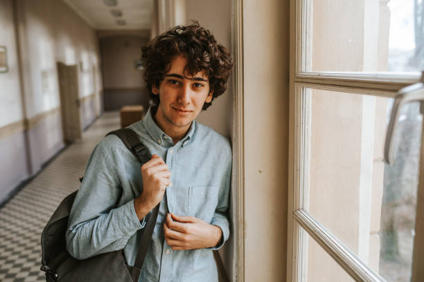 istock Young men in school looking at camera 1152435174
