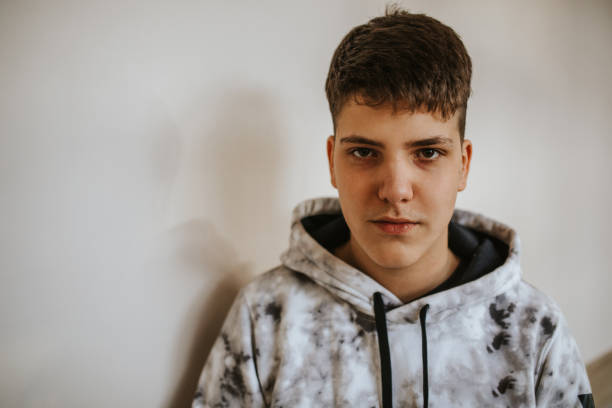 istock Young men in school looking at camera 1152435217