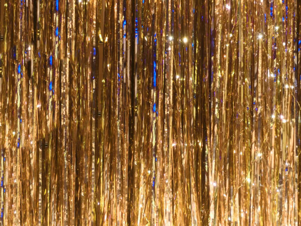 Vibrant metal foil tinsel background style of background and texture tinsel stock pictures, royalty-free photos & images